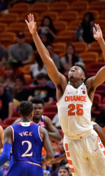 Passing, shooting or both, Graham leads KU against Washington